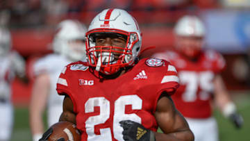 LINCOLN, NE - NOVEMBER 16: Running back Dedrick Mills #26 of the Nebraska Cornhuskers runs against the Wisconsin Badgers at Memorial Stadium on November 16, 2019 in Lincoln, Nebraska. (Photo by Steven Branscombe/Getty Images)