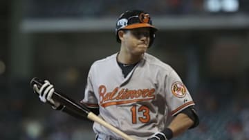May 31, 2014; Houston, TX, USA; Baltimore Orioles third baseman Manny Machado (13) warms up during the fifth inning against the Houston Astros at Minute Maid Park. Mandatory Credit: Andrew Richardson-USA TODAY Sports
