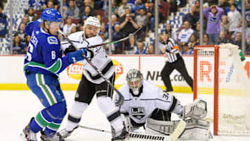 VANCOUVER, BC - MARCH 28: Vancouver Canucks Right Wing Brock Boeser (6) battles with Los Angeles Kings Defenceman Alec Martinez (27) as Goalie Jonathan Quick (32) reaches for the puck during their NHL game at Rogers Arena on March 28, 2019 in Vancouver, British Columbia, Canada. Vancouver won 3-2 in a shootout. (Photo by Derek Cain/Icon Sportswire via Getty Images)