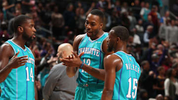 CHARLOTTE, NC - NOVEMBER 15: Dwight Howard #12 of the Charlotte Hornets talks with Michael Kidd-Gilchrist #14 and Kemba Walker #15 on November 15, 2017 at Spectrum Center in Charlotte, North Carolina. NOTE TO USER: User expressly acknowledges and agrees that, by downloading and or using this photograph, User is consenting to the terms and conditions of the Getty Images License Agreement. Mandatory Copyright Notice: Copyright 2017 NBAE (Photo by Kent Smith/NBAE via Getty Images)