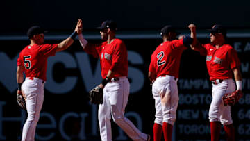 BOSTON, MASSACHUSETTS - AUGUST 15: Enrique Hernandez #5, J.D. Martinez #28, Xander Bogaerts #2 and Hunter Renfroe #10 of the Boston Red Sox celebrate after defeating the Baltimore Orioles 6-2 at Fenway Park on August 15, 2021 in Boston, Massachusetts. (Photo by Maddie Meyer/Getty Images)
