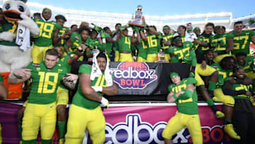 SANTA CLARA, CA - DECEMBER 31: The Oregon Ducks celebrate defeating the Michigan State Spartans 7-6 in the Redbox Bowl at Levi's Stadium on December 31, 2018 in Santa Clara, California. (Photo by Thearon W. Henderson/Getty Images)