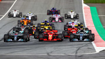 SPIELBERG, AUSTRIA - JULY 01: Lewis Hamilton of Great Britain driving the (44) Mercedes AMG Petronas F1 Team Mercedes WO9, Sebastian Vettel of Germany driving the (5) Scuderia Ferrari SF71H and Valtteri Bottas driving the (77) Mercedes AMG Petronas F1 Team Mercedes WO9 (Photo by Mark Thompson/Getty Images)