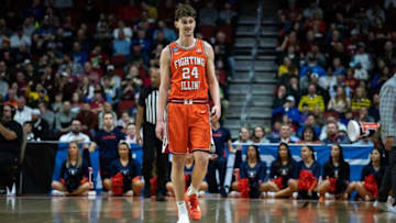 Illinois' Matthew Mayer plays with only one shoe after it fell off during the NCAA men's basketball tournament first round match-up between Illinois and Arkansas, on Thursday, March 16, 2023, at Wells Fargo Arena, in Des Moines, Iowa.0316 Illinos Arkansas 001 Arw