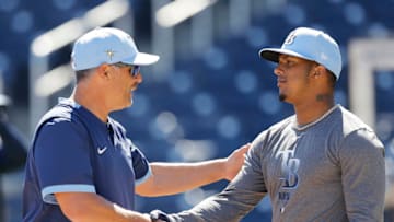 WEST PALM BEACH, FLORIDA - FEBRUARY 28: Manager Kevin Cash of the Tampa Bay Rays greets Wander Franco #80 prior to the Grapefruit League spring training game against the Washington Nationals at FITTEAM Ballpark of The Palm Beaches on February 28, 2020 in West Palm Beach, Florida. (Photo by Michael Reaves/Getty Images)