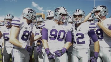 Oct 18, 2014; Norman, OK, USA; Kansas State Wildcats players celebrate the victory against the Oklahoma Sooners at Gaylord Family - Oklahoma Memorial Stadium. Mandatory Credit: Kevin Jairaj-USA TODAY Sports