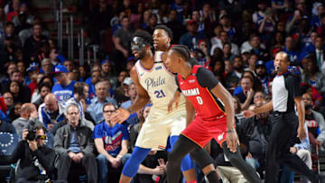 PHILADELPHIA, PA - APRIL 24: Joel Embiid #21 of the Philadelphia 76ers battles for position against Hassan Whiteside #21 and Josh Richardson #0 of the Miami Heat in Game Five of Round One of the 2018 NBA Playoffs on April 24, 2018 at Wells Fargo Center in Philadelphia, Pennsylvania. NOTE TO USER: User expressly acknowledges and agrees that, by downloading and or using this photograph, User is consenting to the terms and conditions of the Getty Images License Agreement. Mandatory Copyright Notice: Copyright 2018 NBAE (Photo by Jesse D. Garrabrant/NBAE via Getty Images)