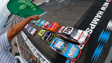 LOUDON, NH - JULY 15: Kyle Busch, driver of the #18 NOS Energy Drink Toyota, and Brad Keselowski, driver of the #22 Discount Tire Ford, lead the field to the green flag to start the NASCAR XFINITY Series Overton's 200 at New Hampshire Motor Speedway on July 15, 2017 in Loudon, New Hampshire. (Photo by Sean Gardner/Getty Images)