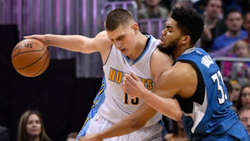 DENVER, CO - FEBRUARY 15: Minnesota Timberwolves center Karl-Anthony Towns (32) reaches in on Denver Nuggets forward Nikola Jokic (15) during the third quarter February 15, 2017 at Pepsi Center. (Photo By John Leyba/The Denver Post via Getty Images)