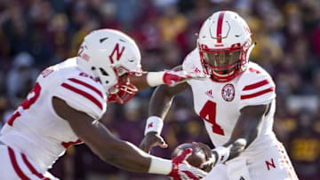 Oct 17, 2015; Minneapolis, MN, USA; Nebraska Cornhuskers quarterback Tommy Armstrong Jr. (4) hands off the ball to Nebraska Cornhuskers running back Devine Ozigbo (22) in the first half at TCF Bank Stadium. Mandatory Credit: Jesse Johnson-USA TODAY Sports
