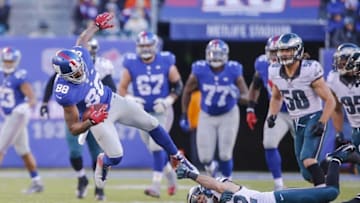 Jan 3, 2016; East Rutherford, NJ, USA; Philadelphia Eagles free safety Chris Maragos (42) tackles New York Giants wide receiver Hakeem Nicks (88) during the second half at MetLife Stadium. The Eagles won 35-30. Mandatory Credit: Jim O