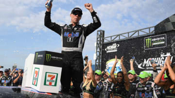 BROOKLYN, MICHIGAN - AUGUST 11: Kevin Harvick, driver of the #4 Mobil 1 Ford, celebrates in Victory Lane after winning the Monster Energy NASCAR Cup Series Consumers Energy 400 at Michigan International Speedway on August 11, 2019 in Brooklyn, Michigan. (Photo by Stacy Revere/Getty Images)