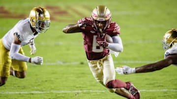 Florida State Seminoles wide receiver Keyshawn Helton runs against Notre Dame Fighting Irish at Doak Campbell Stadium. Tallahassee Democrat.
