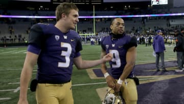 SEATTLE, WA - NOVEMBER 17: Jake Browning #3 and Myles Gaskin #9 of the Washington Huskies celebrate their 42-23 win against the Oregon State Beavers during their game at Husky Stadium on November 17, 2018 in Seattle, Washington. (Photo by Abbie Parr/Getty Images)