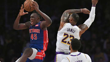 Detroit Pistons Sekou Doumbouya against Los Angeles Lakers LeBron James and Anthony Davis. (Photo by John McCoy/Getty Images)