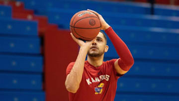 Feb 27, 2021; Lawrence, Kansas, USA; Kansas Jayhawks guard Tristan Enaruna (13) shoots the ball during warm ups before hosting the Baylor Bears at Allen Fieldhouse. Mandatory Credit: Amy Kontras-USA TODAY Sports