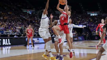 Mar 21, 2022; Baton Rouge, Louisiana, USA; Ohio State Buckeyes guard Jacy Sheldon (4) drives to the basket against LSU Lady Tigers forward Awa Trasi (32) during the second half at the Pete Maravich Assembly Center. Mandatory Credit: Stephen Lew-USA TODAY Sports