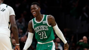 Nov 12, 2021; Boston, Massachusetts, USA; Boston Celtics guard Dennis Schroder (71) smiles after making a three point basket against the Milwaukee Bucks during overtime at TD Garden. Mandatory Credit: Winslow Townson-USA TODAY Sports