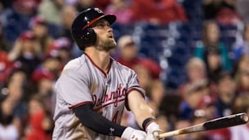 Apr 15, 2016; Philadelphia, PA, USA; Washington Nationals right fielder Bryce Harper watches his two RBI home run during the sixth inning against the Philadelphia Phillies at Citizens Bank Park. The Washington Nationals won 9-1. Mandatory Credit: Bill Streicher-USA TODAY Sports