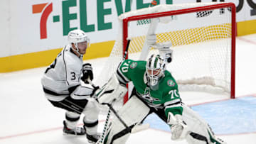 DALLAS, TEXAS - OCTOBER 22: Braden Holtby #70 of the Dallas Stars blocks a shot on goal against Matt Roy #3 of the Los Angeles Kings in the overtime period at American Airlines Center on October 22, 2021 in Dallas, Texas. (Photo by Tom Pennington/Getty Images)
