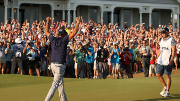 KIAWAH ISLAND, SOUTH CAROLINA - MAY 23: Phil Mickelson of the United States celebrates with brother and caddie Tim Mickelson on the 18th green after winning during the final round of the 2021 PGA Championship held at the Ocean Course of Kiawah Island Golf Resort on May 23, 2021 in Kiawah Island, South Carolina. (Photo by Patrick Smith/Getty Images)