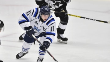 BOISBRIAND, QC - SEPTEMBER 27: Rafael Harvey-Pinard #11 of the Chicoutimi Sagueneens skates the puck against the Blainville-Boisbriand Armada at Centre d'Excellence Sports Rousseau on September 27, 2019 in Boisbriand, Quebec, Canada. The Chicoutimi Sagueneens defeated the Blainville-Boisbriand Armada 4-3 in a shoot-out. (Photo by Minas Panagiotakis/Getty Images)