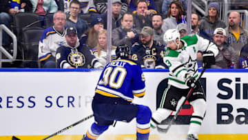Dec 17, 2021; St. Louis, Missouri, USA; Dallas Stars defenseman John Klingberg (3) passes the puck as St. Louis Blues center Ryan O'Reilly (90) defends during the first period at Enterprise Center. Mandatory Credit: Jeff Curry-USA TODAY Sports