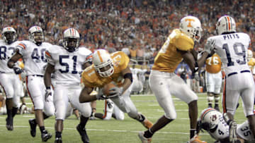 ATLANTA - DECEMBER 4: Running back Gerald Riggs Jr. #31 of the Tennessee Volunteers scores a touchdown against the Auburn Tigers in the 2004 SEC Championship Game at the Georgia Dome on December 4, 2004 in Atlanta, Georgia. (Photo by Grant Halverson/Getty Images)
