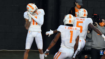 Dec 12, 2020; Nashville, Tennessee, USA; Tennessee Volunteers wide receiver Jalin Hyatt (11) celebrates after a touchdown reception during the first half against the Vanderbilt Commodores at Vanderbilt Stadium. Mandatory Credit: Christopher Hanewinckel-USA TODAY Sports