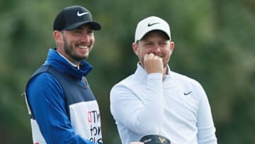 PALM BEACH GARDENS, FLORIDA - FEBRUARY 27: Tom Lewis of England and his caddie Jonathan Bell look on from the fourth tee during the first round of the Honda Classic at PGA National Resort and Spa Champion course on February 27, 2020 in Palm Beach Gardens, Florida. (Photo by Matt Sullivan/Getty Images)