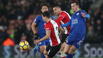 SOUTHAMPTON, ENGLAND - DECEMBER 13: Ben Chilwell of Leicester City is challenged by Cedric Soares of Southampton and Dusan Tadic of Southampton during the Premier League match between Southampton and Leicester City at St Mary's Stadium on December 13, 2017 in Southampton, England. (Photo by Dan Istitene/Getty Images)