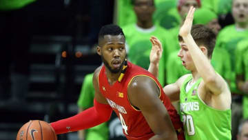Jan 23, 2016; East Lansing, MI, USA; Maryland Terrapins forward Robert Carter (4) posts up against Michigan State Spartans guard Matt McQuaid (20) during the second half of a game at Jack Breslin Student Events Center. Mandatory Credit: Mike Carter-USA TODAY Sports