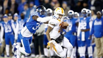 LEXINGTON, KY - OCTOBER 28: Jarrett Guarnanto of the Tennessee Volunteers runs with the ball while defended by Denzil Ware #35 of the Kentucky Wildcats at Commonwealth Stadium on October 28, 2017 in Lexington, Kentucky. (Photo by Andy Lyons/Getty Images)