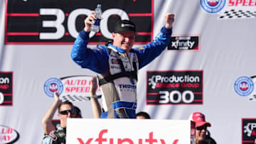 FONTANA, CA - MARCH 16: Cole Custer, driver of the #00 Thompson Pipe/Haas CNC Ford, celebrates in victory lane after winnig the NASCAR Xfinity Series Production Alliance Group 300 at Auto Club Speedway on March 16, 2019 in Fontana, California. (Photo by Jared C. Tilton/Getty Images)
