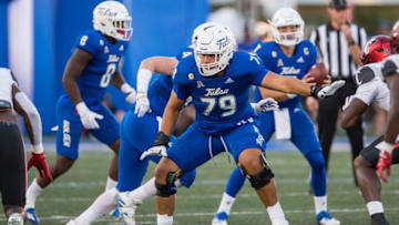 Auburn football Oct 1, 2022; Tulsa, Oklahoma, USA; Tulsa Golden Hurricane offensive lineman Jaden Muskrat (79) blocks during the first quarter against the Cincinnati Bearcats at Skelly Field at H.A. Chapman Stadium. Cincinnati won 31-21. Mandatory Credit: Brett Rojo-USA TODAY Sports