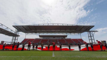 May 21, 2016; Toronto, Ontario, CAN; Group of children practice rolling out the Canadian flag prior to an MLS game between Columbus Crew and Toronto FC at BMO Field. Mandatory Credit: Kevin Sousa-USA TODAY Sports