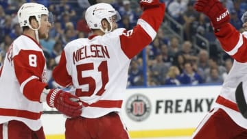 Oct 13, 2016; Tampa, FL, USA; Detroit Red Wings center Frans Nielsen (51) is congratulated after he scored a goal against Tampa Bay Lightning during the second period at Amalie Arena. Mandatory Credit: Kim Klement-USA TODAY Sports
