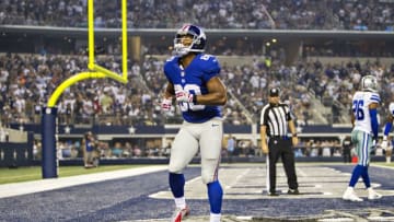 ARLINGTON, TX - SEPTEMBER 08: Victor Cruz #80 of the New York Giants does his touchdown dance against the Dallas Cowboys at AT&T Stadium on September 8, 2013 in Arlington, Texas. The Cowboys defeated the Giants 36-31. (Photo by Wesley Hitt/Getty Images)