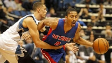 Nov 20, 2015; Minneapolis, MN, USA; Minnesota Timberwolves guard Zach LaVine (8) fouls Detroit Pistons guard Spencer Dinwiddie (8) late in the first quarter at Target Center. Mandatory Credit: Bruce Kluckhohn-USA TODAY Sports