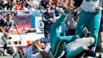 FOXBOROUGH, MA - SEPTEMBER 30: Adam Butler #70 of the New England Patriots sacks Ryan Tannehill #17 of the Miami Dolphins during the second half at Gillette Stadium on September 30, 2018 in Foxborough, Massachusetts. (Photo by Jim Rogash/Getty Images)