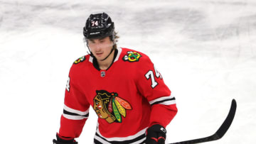 CHICAGO, ILLINOIS - FEBRUARY 02: Nicolas Beaudin #74 of the Chicago Blackhawks participates in warm-ups before a game against the Carolina Hurricanes at the United Center on February 02, 2021 in Chicago, Illinois. (Photo by Jonathan Daniel/Getty Images)