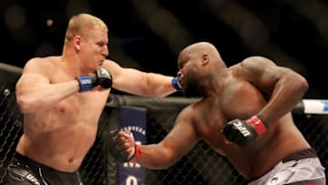 DALLAS, TEXAS - JULY 30: Sergei Pavlovich (L) of Russia punches Derrick Lewis in their heavyweight bout during UFC 277 at American Airlines Center on July 30, 2022 in Dallas, Texas. (Photo by Carmen Mandato/Getty Images)