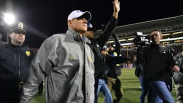 Nov 21, 2015; Oxford, MS, USA; LSU Tigers head coach Les Miles walks onto the field after the game against the Mississippi Rebels at Vaught-Hemingway Stadium. Mississippi won 38-17. Mandatory Credit: Matt Bush-USA TODAY Sports