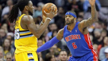Mar 19, 2014; Denver, CO, USA; Detroit Pistons small forward Josh Smith (6) defends Denver Nuggets small forward Kenneth Faried (35) in the second quarter at the Pepsi Center. Mandatory Credit: Isaiah J. Downing-USA TODAY Sports