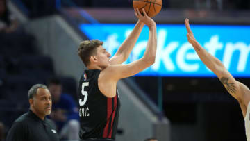 Miami Heat forward Nikola Jovic (5) shoots against the Sacramento Kings(Darren Yamashita-USA TODAY Sports)