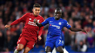 LONDON, ENGLAND - SEPTEMBER 29: N'golo Kante of Chelsea is tackled by Roberto Firmino of Liverpool during the Premier League match between Chelsea FC and Liverpool FC at Stamford Bridge on September 29, 2018 in London, United Kingdom. (Photo by Shaun Botterill/Getty Images)