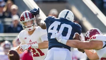 UNIVERSITY PARK, PA - SEPTEMBER 30: Jason Cabinda #40 of the Penn State Nittany Lions pushes past Brandon Knight #62 to sack Richard Lagow #21 of the Indiana Hoosiers during the first half on September 30, 2017 at Beaver Stadium in University Park, Pennsylvania. (Photo by Brett Carlsen/Getty Images)