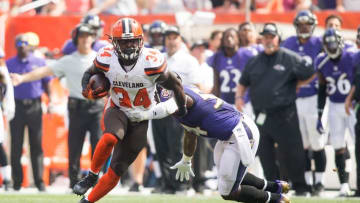 Sep 18, 2016; Cleveland, OH, USA; Cleveland Browns running back Isaiah Crowell (34) runs the ball past Baltimore Ravens inside linebacker Zach Orr (54) for a first down during the first quarter at FirstEnergy Stadium. Mandatory Credit: Scott R. Galvin-USA TODAY Sports
