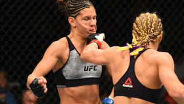 DETROIT, MI - DECEMBER 02: (R-L) Felice Herrig punches Cortney Casey in their women's strawweight bout during the UFC 218 event inside Little Caesars Arena on December 02, 2017 in Detroit, Michigan. (Photo by Josh Hedges/Zuffa LLC/Zuffa LLC via Getty Images)
