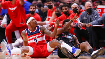 Washington Wizards guard Bradley Beal (3) and Miami Heat guard Kyle Lowry (7) reacts after a play(Sam Navarro-USA TODAY Sports)